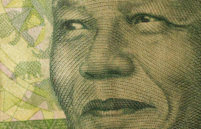 A stylised close-up photograph of Wolsey Hall Oxford alumnus Nelson Mandela, former President of South Africa.