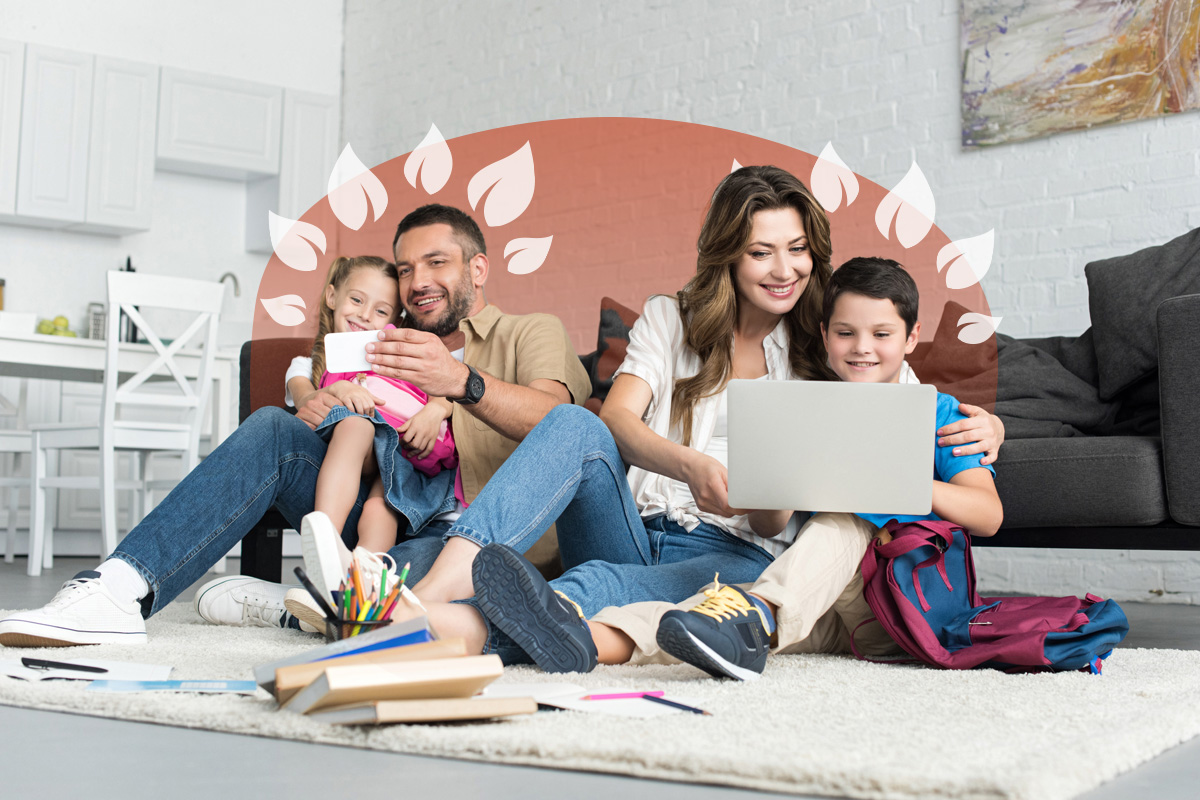 A family with two young children learning together at home, enjoying the flexibility of online education.