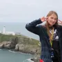 Wolsey Hall Oxford student, Lily, on a cliff.
