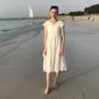 Wolsey Hall Oxford student, Evangelista, on a beach.