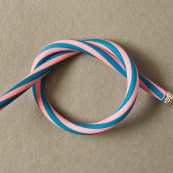 A flexible, striped pencil bent into a loop, symbolising adaptability.