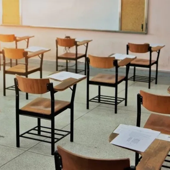 Desks and chairs in an exam centre.