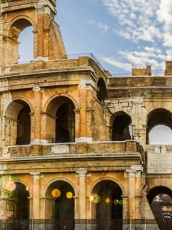 A landscape view of the Colosseum in Rome, Italy.