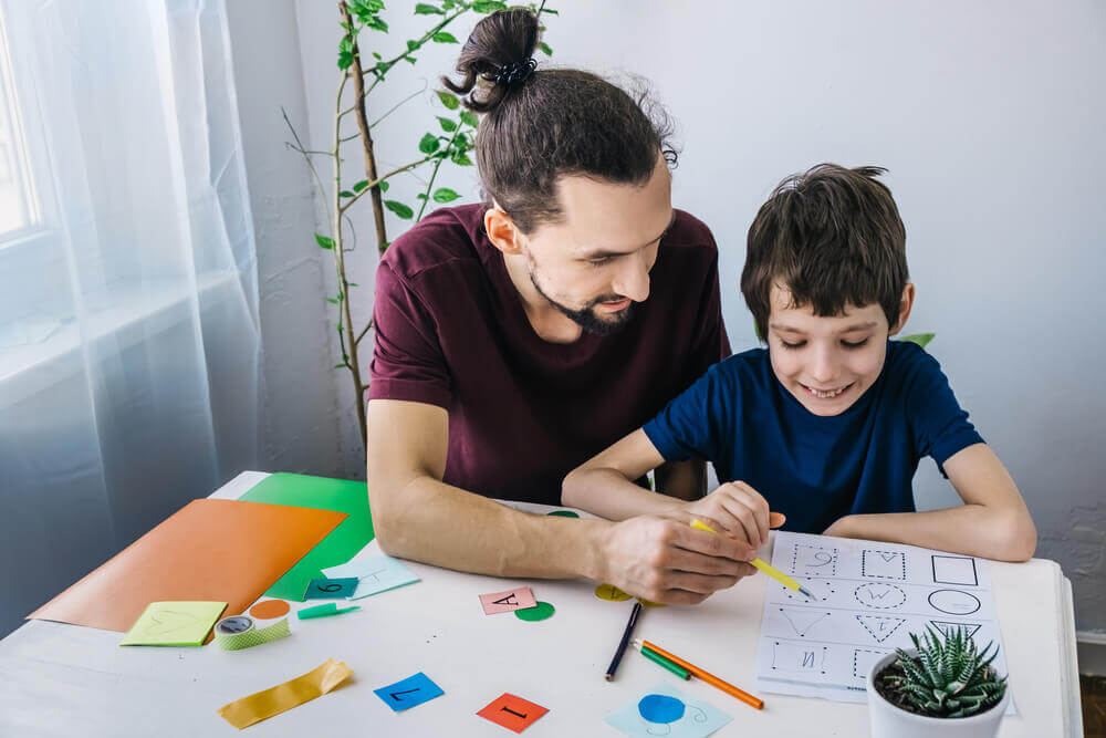 Father and son learning about shapes.
