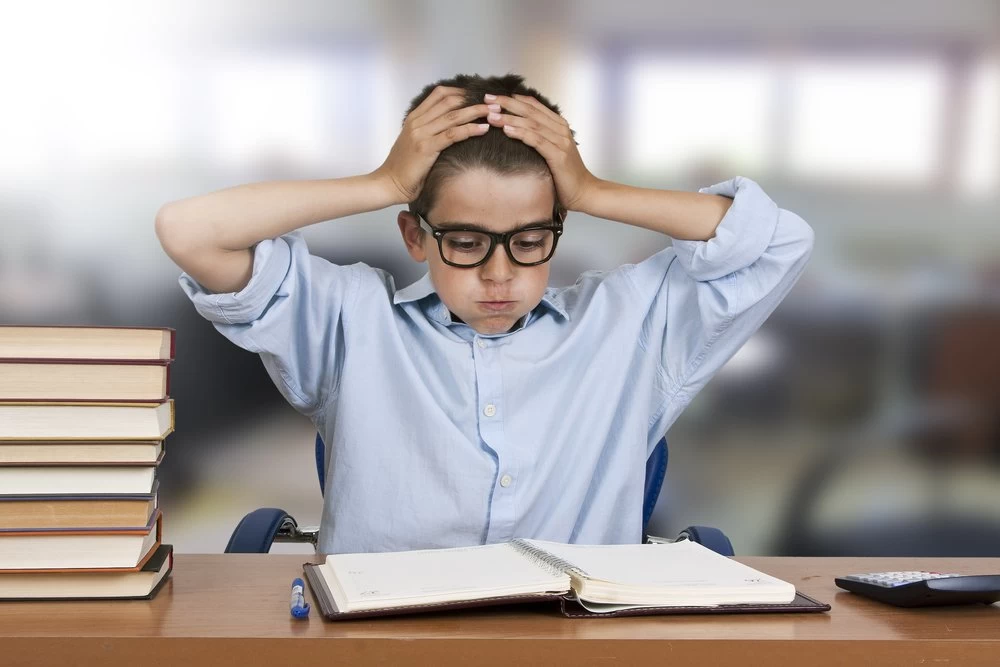 Young male child, deeply exhaling.